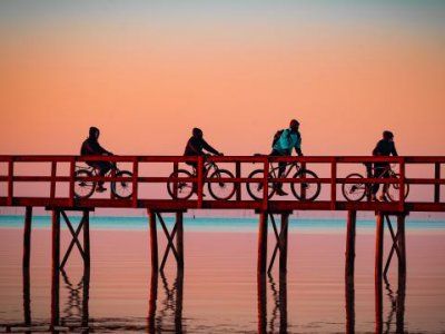 Four cyclists getting outside for sunrise at the Trapiche in Pelotas, Brazil
